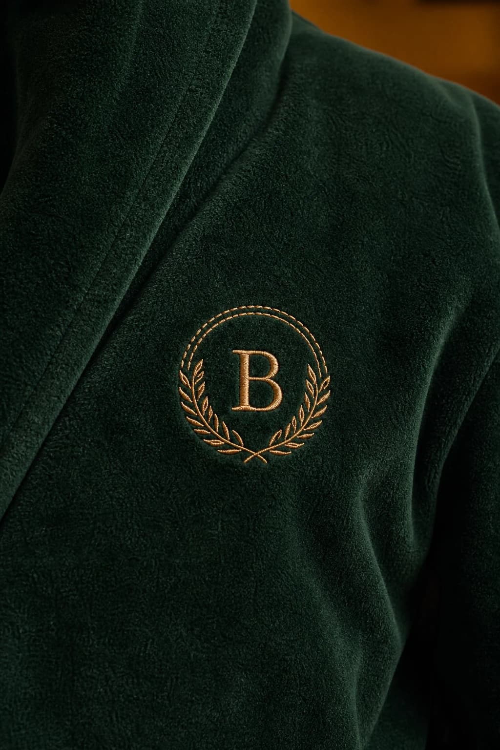 Daniel Green terry robe detail showing the shawl collar and belt.