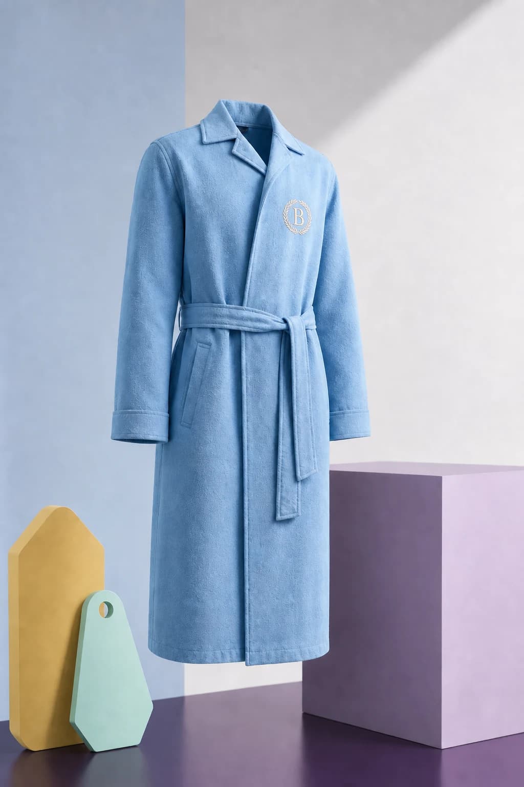 Expense-Report Blue Oxford-weave robe displayed with blank yellow and mint key-shaped forms.